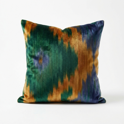 Green, amber and blue silk velvet ikat pillow cover, angled view